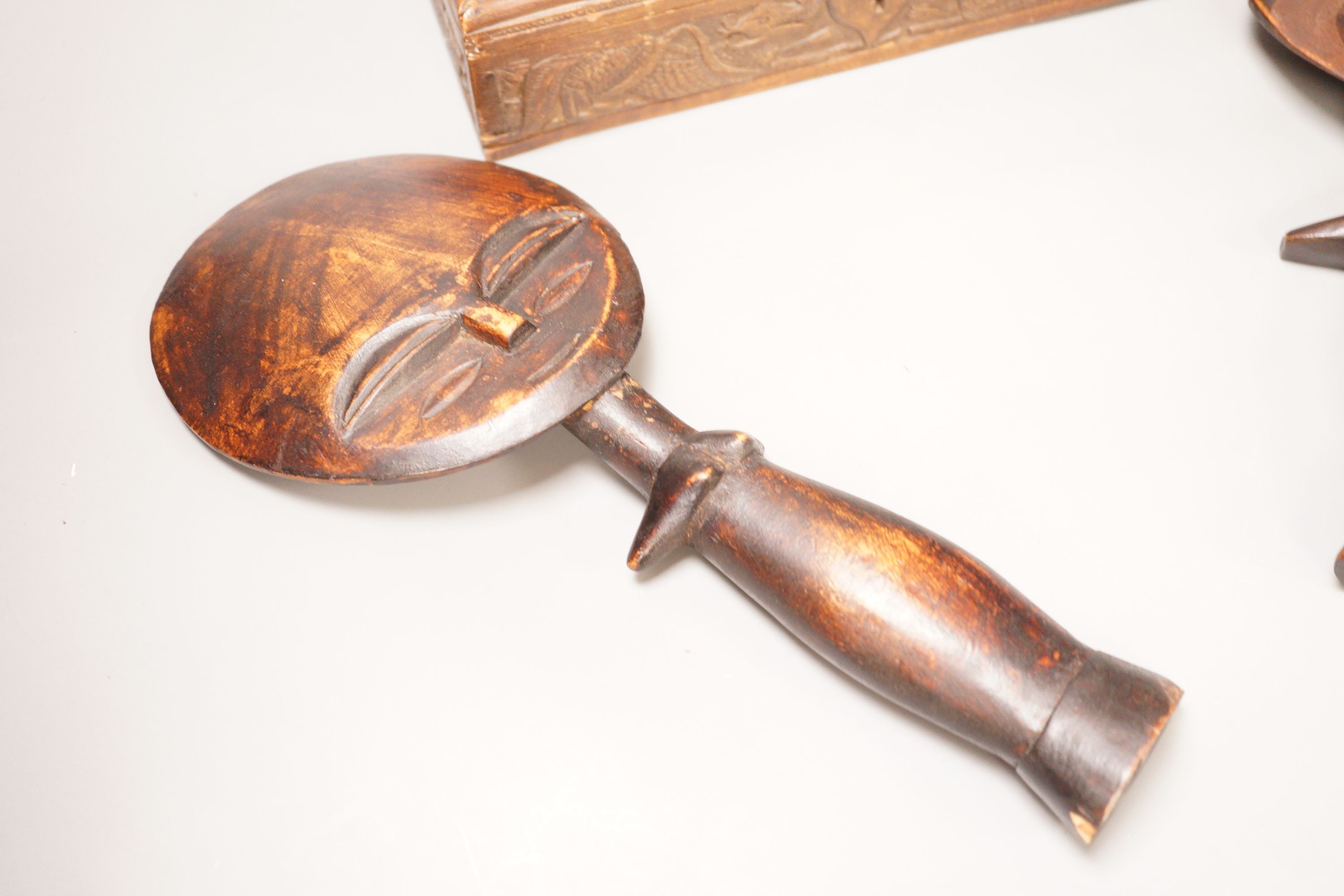 Two carved African wooden figures, together with a Burmese carved dragon wooden box